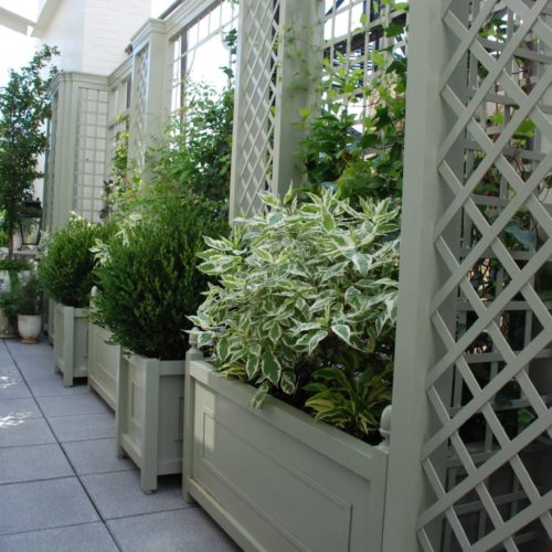 Aluminum treillage and planters on balcony