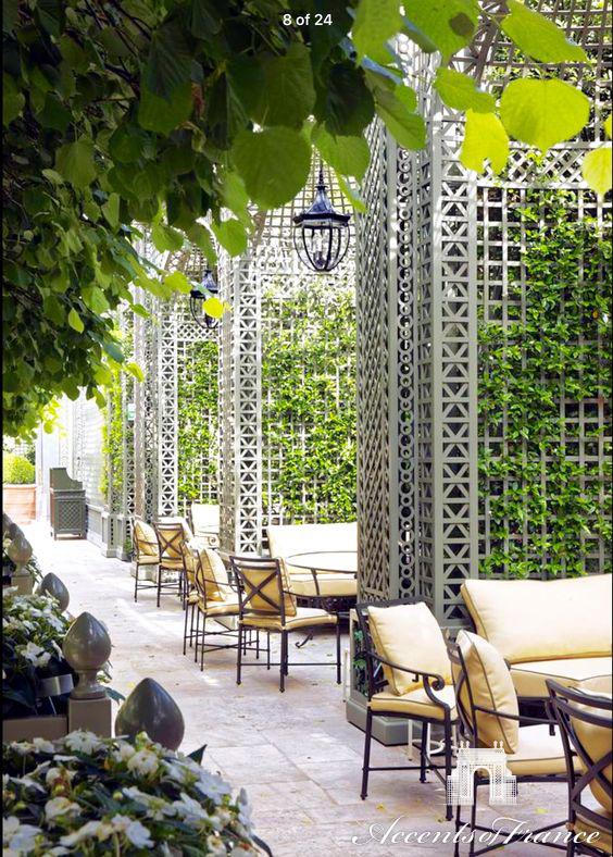 Custom decorative wood treillage with alcoves in the Winter Garden at the Ritz Hotel in Paris. Painted in custom color.
