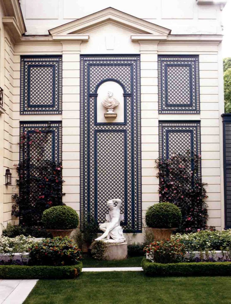 Greater sophistication added to the facade of a building with decorative latticework panels.